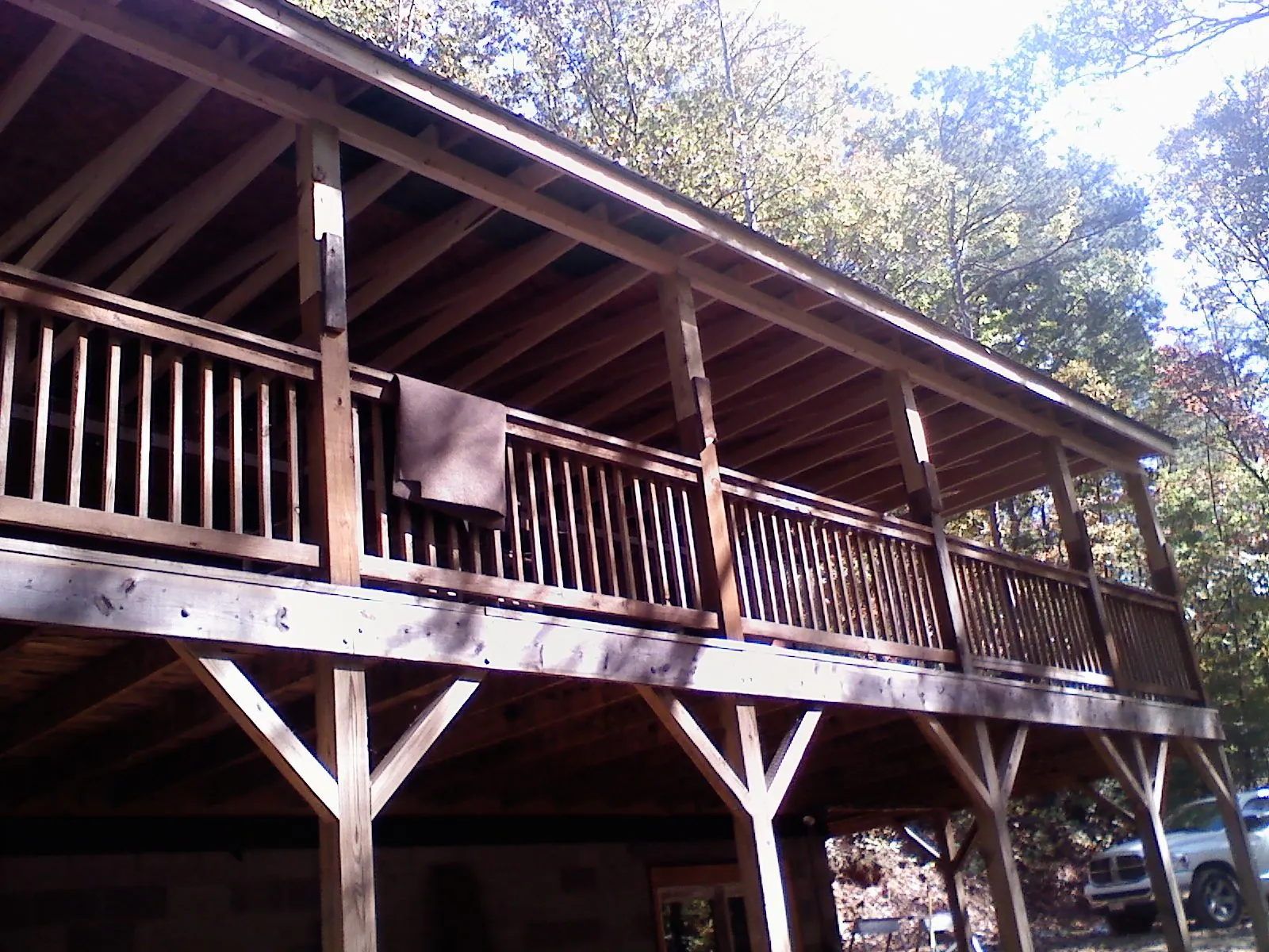 Timber framing under a new elevated porch and deck — Roof Leak Repair in Mantee by Roofing Brothers